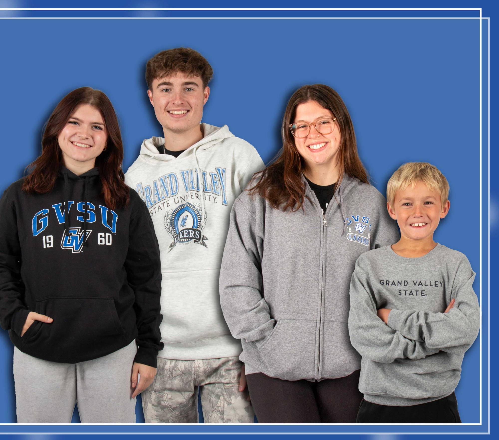 4 people modeling GVSU sweatshirts